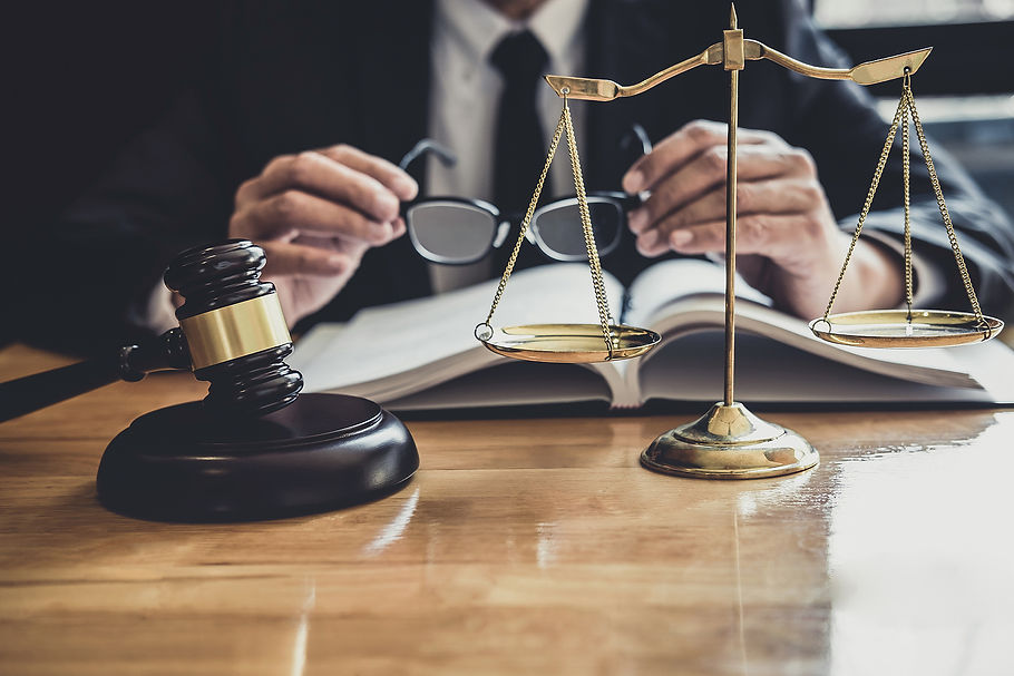 bigstock-Male-Lawyer-Or-Judge-Working-W-385610483.jpg