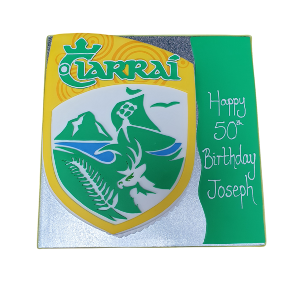 Bespoke Kerry GAA Gaelic football badge cake with detailed green and gold icing, Solihull, West Midlands.