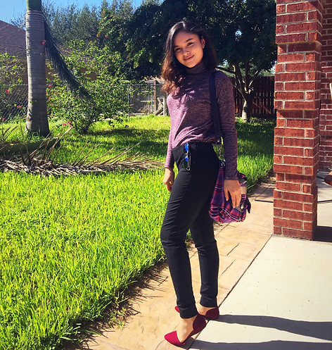 teen beauty blogger styling a Coach purse