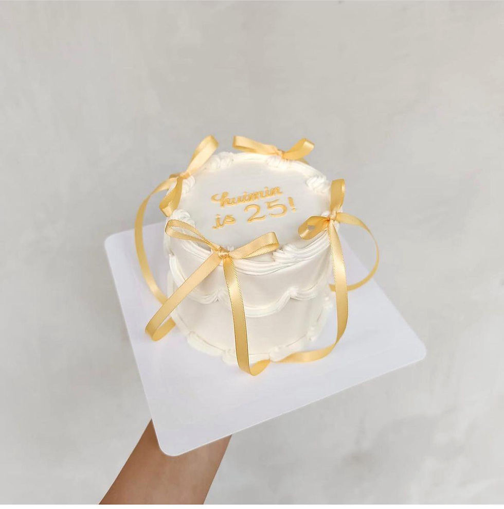 Thumbnail: Petite white cake with coloured bows