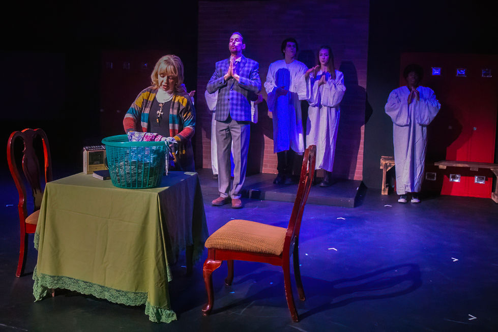 Christina Clodt as Margaret White listens to her favorite, Reverend Bliss played by Joshua Hengst sing Open Your Heart