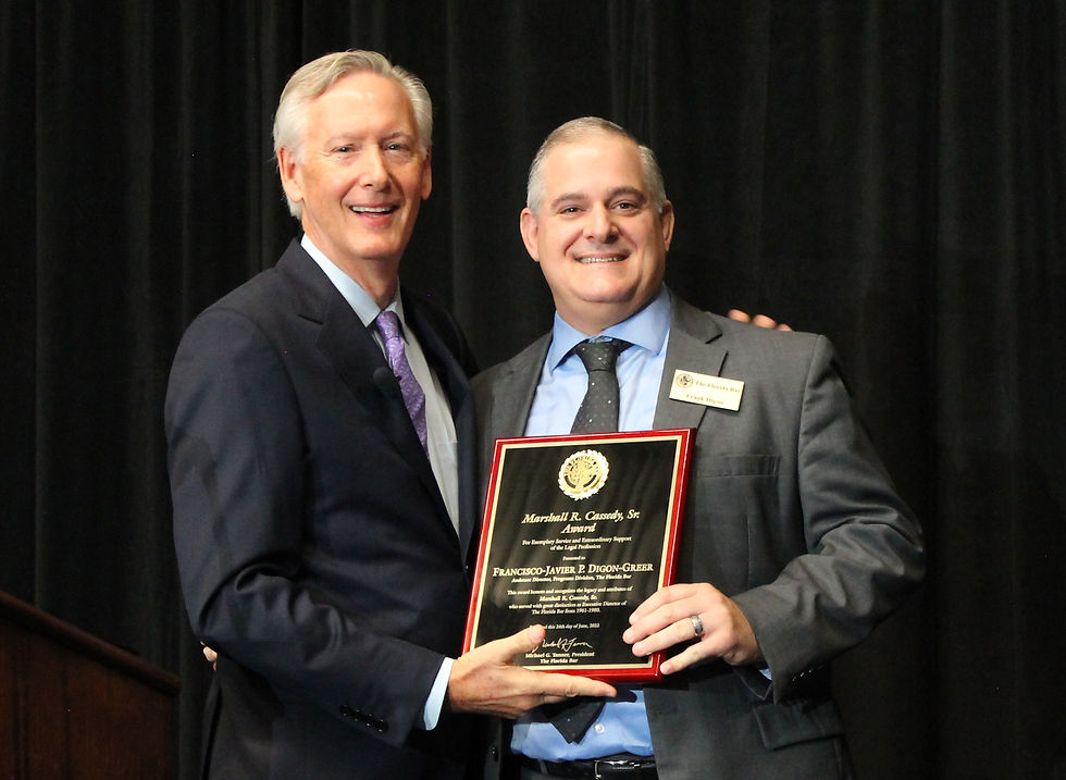 During the 2022 Annual Florida Bar Convention, outgoing Bar President Mike Tanner presented Frank Digon-Greer with the Marshall R. Cassedy, Sr., Award for his “extraordinary efforts” to advance pro bono service in Florida.