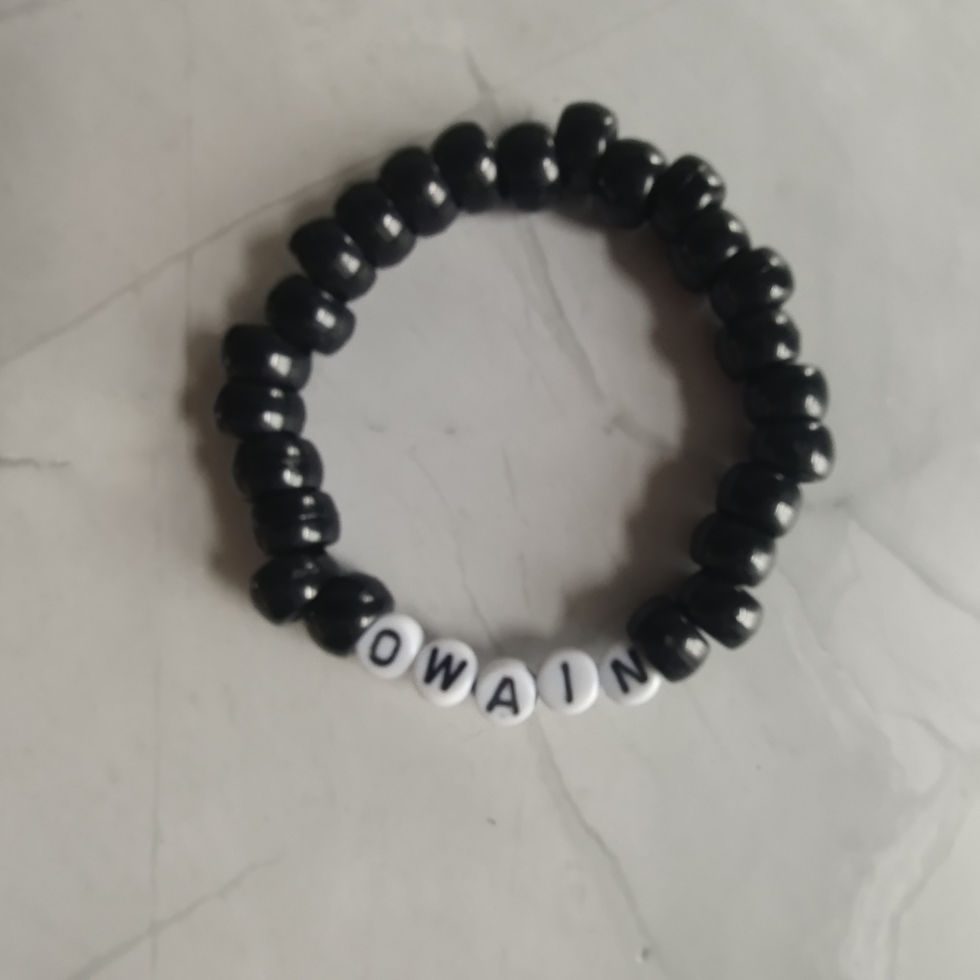 An example of a single colour named bracelet, in black