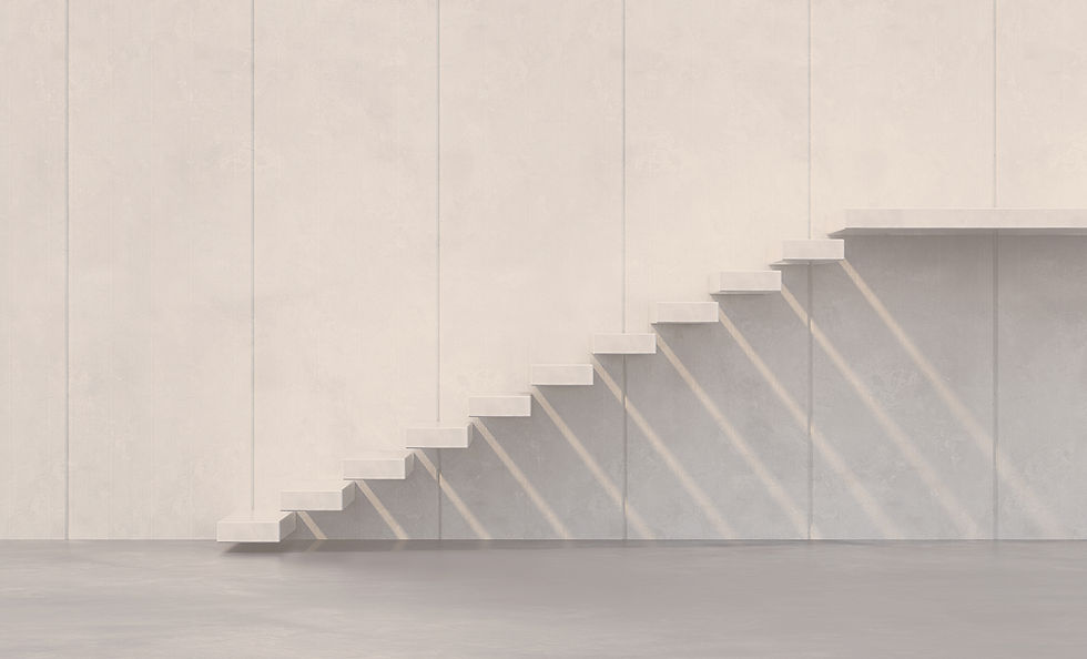 Modern concrete staircase against a light wall