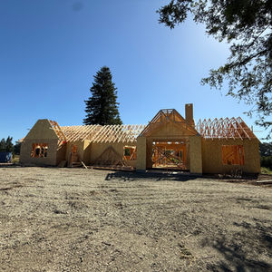 front of new custom frame with Trussed roof
