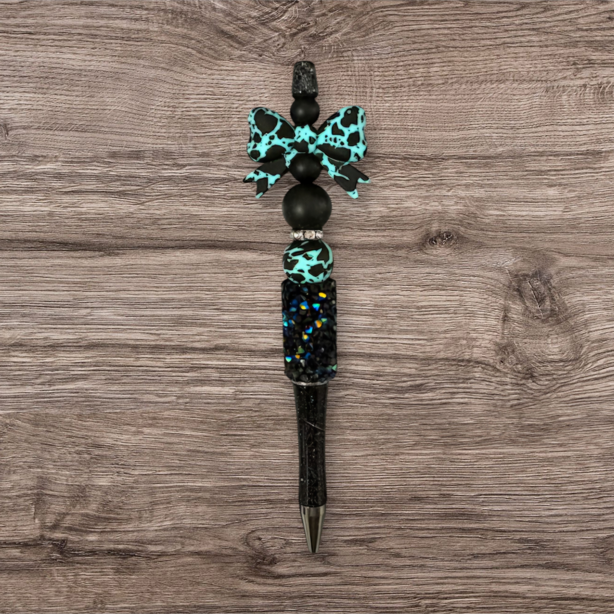 Turquoise Cow Bow Pen