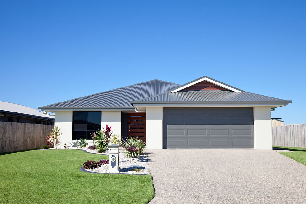 Modern single-story house with a grey roof and garage.