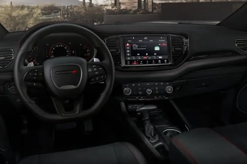 Dodge Durango front interior with the steering wheel, gauges and touchscreen