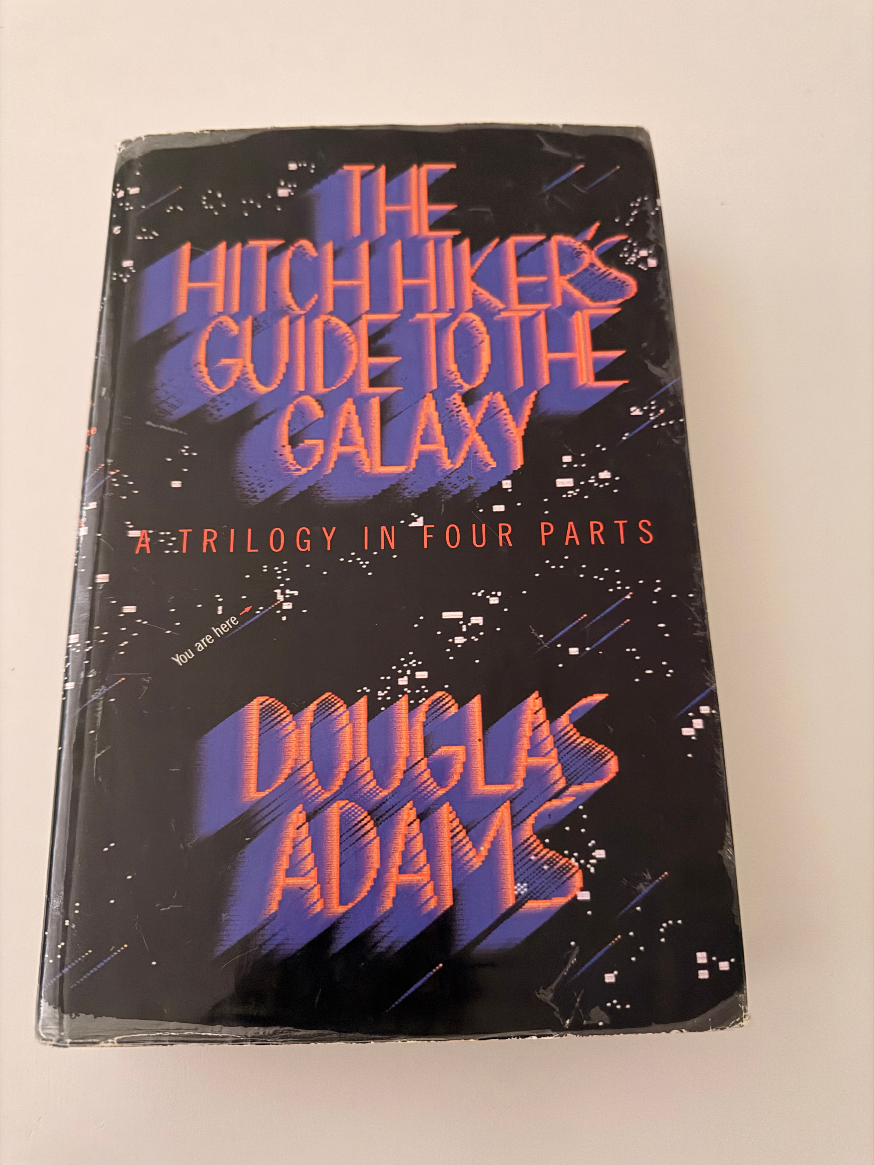 The Hitch Hiker's Guide To The Galaxy by Douglas Adams