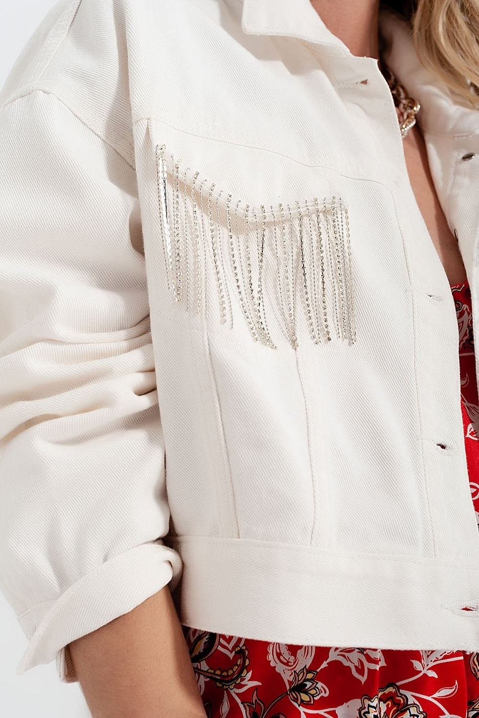 Miniatura: Giacca in denim con frange e strass - la moda contemporanea