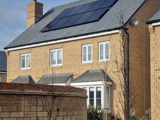 Sleek Black Solar Panel Installation and 6.5kWh Battery Storage System on a New Build Property