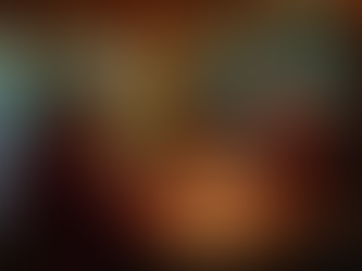 Three people enjoy a candlelit dinner with festive lights and decorations. Warm, cozy atmosphere, with smiles and holiday cheer.