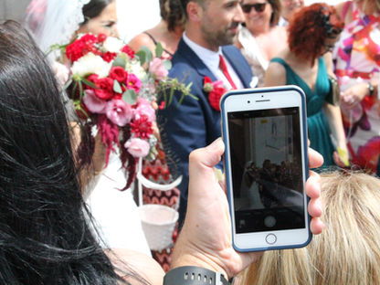 guest filming wedding
