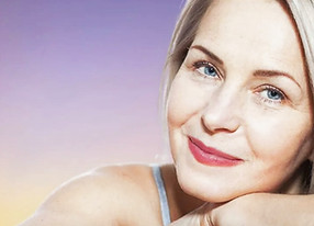 Out-of-town facelift patient glowing after neck lift at Dr. Rieger’s plastic surgery clinic in Wichita Kansas
