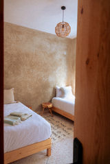 shared triple room in a cozy set up