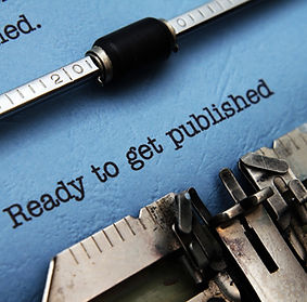 A typewriter that says "Ready to Get Published" on the page