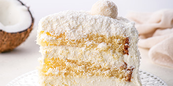 Fresh cream vanilla cake topped with coconut flakes - Ashma, OSCAR Care Group Dietitian in Queensland