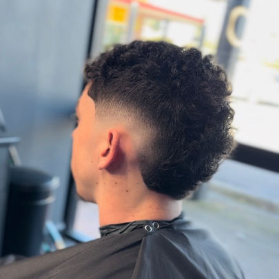 Men's burst fade hair cut