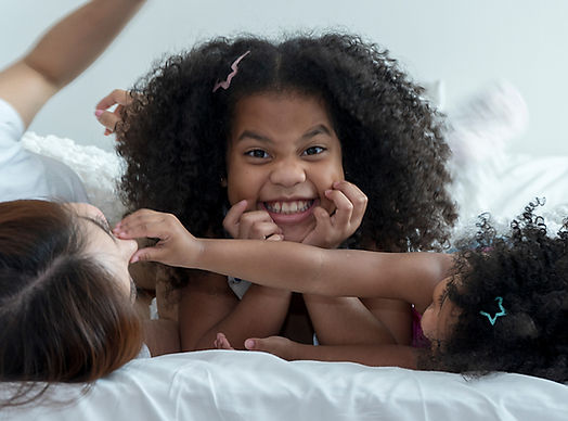 Portrait of happy two black curly hair