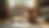 Eye-level view of a cozy pet sitting area with a dog resting on a soft bed