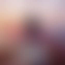 Person in a sweater gazes at a sunset over water. Text: 80% off second sailor, up to $400 free drinks. Virgin Voyages with love from the world.