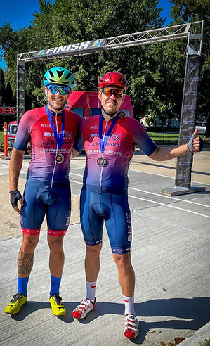two cyclists at the finish line