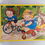 Thumbnail: Campbell Kids Gym Tray Puzzle Girl Boy Dog Riding Bikes 12.5 x 9.5"