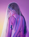 Oil painting "Revelation" by Morgan Bisoux, depicting a person covered by a transparent drape, allowing a glimpse of the body underneath. The vivid, iridescent palette evokes ethereal presence and explores themes of visibility, identity, and the intangible.