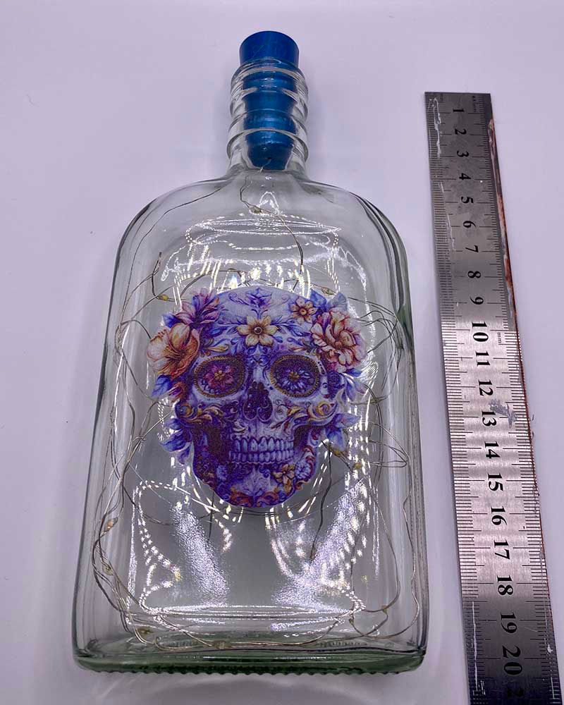Thumbnail: recycled skull led bottle