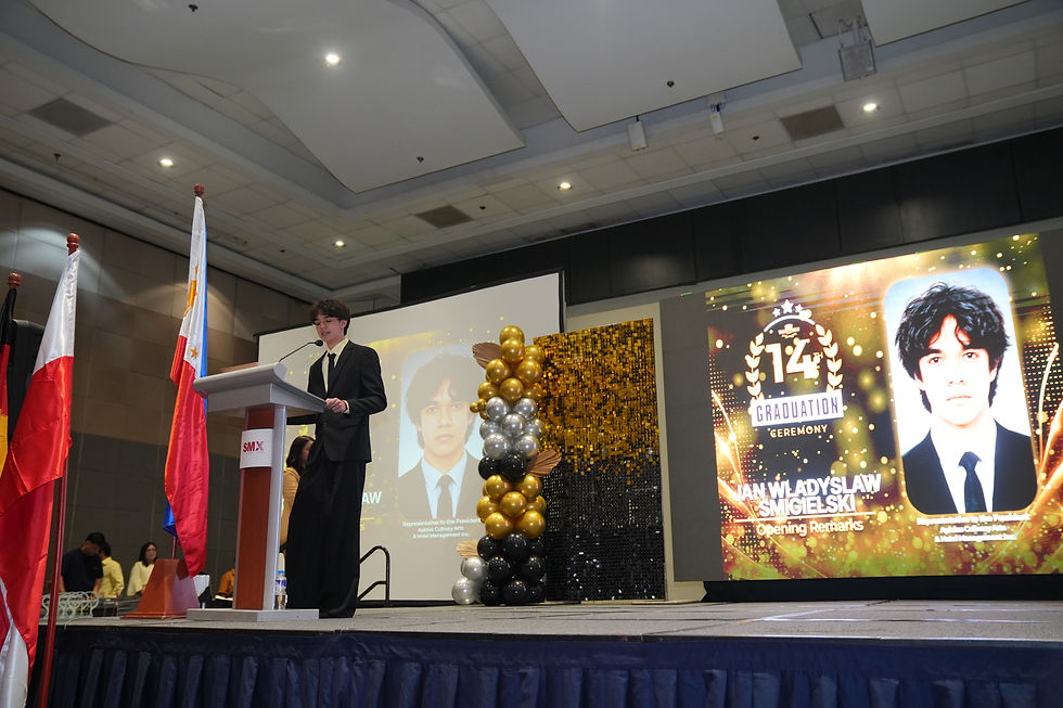 Yan Vwadiswav B. Shmigelski, representing Apicius President Anna Weronika Smigielska, who shared words of encouragement with the graduating class.