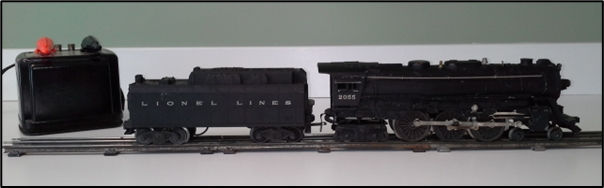 1. 2019 Photo op for my 1950’s Lionel locomotive, tender, and transformer before donation to a charity.