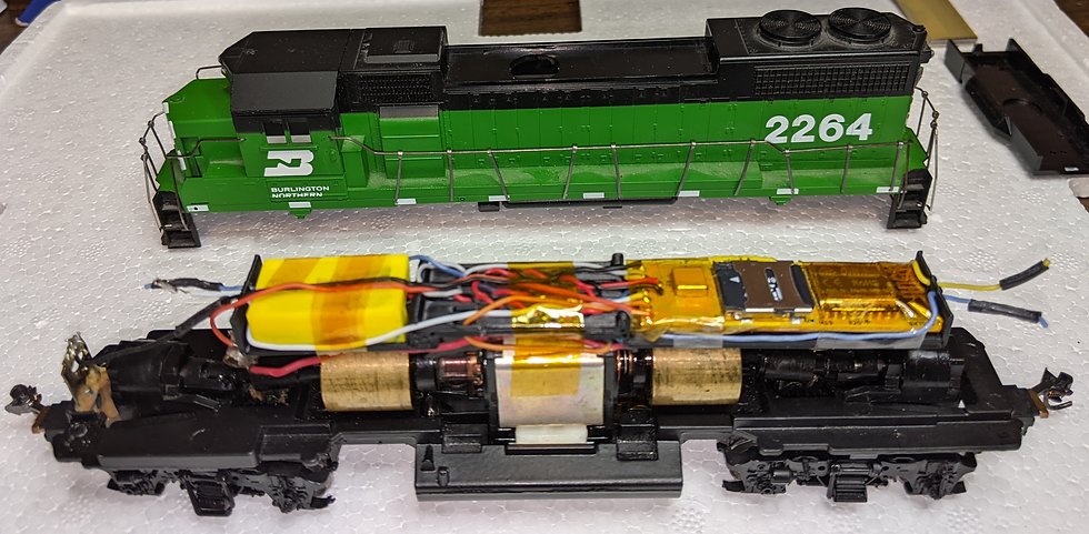 14. Almost final installation with shortened wire leads and Kapton® tape for attachments. Wires are tucked under the mounting platform and away from drivetrain components. The lights, however, were not connected at this stage.