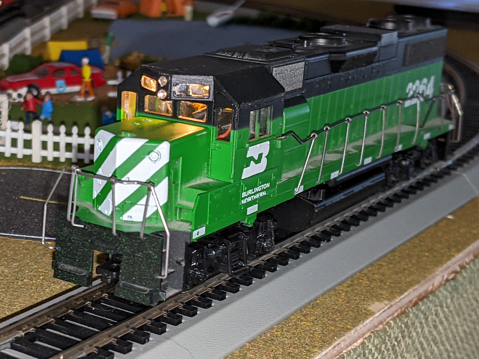 17. Locomotive operating with cab light and headlight illuminated.
