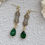 Thumbnail: Art Nouveau Style Gold and Green Glass Drop Earrings