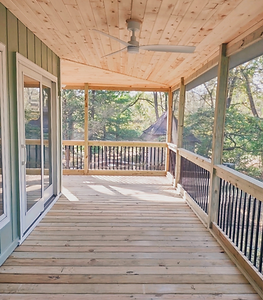 New wraparound screened-in deck