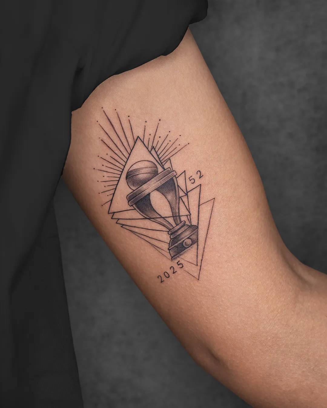 World Cup trophy tattoo 2025 on Harmanpreet Kaur’s arm – Aliens Tattoo