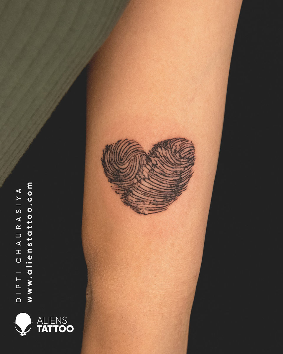 fingerprint heart tattoo