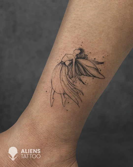 delicate fairy tattoo showing flow and movement.