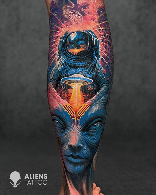 Vibrant sci fi alien and astronaut realism tattoo created at the best tattoo studio in Hyderabad