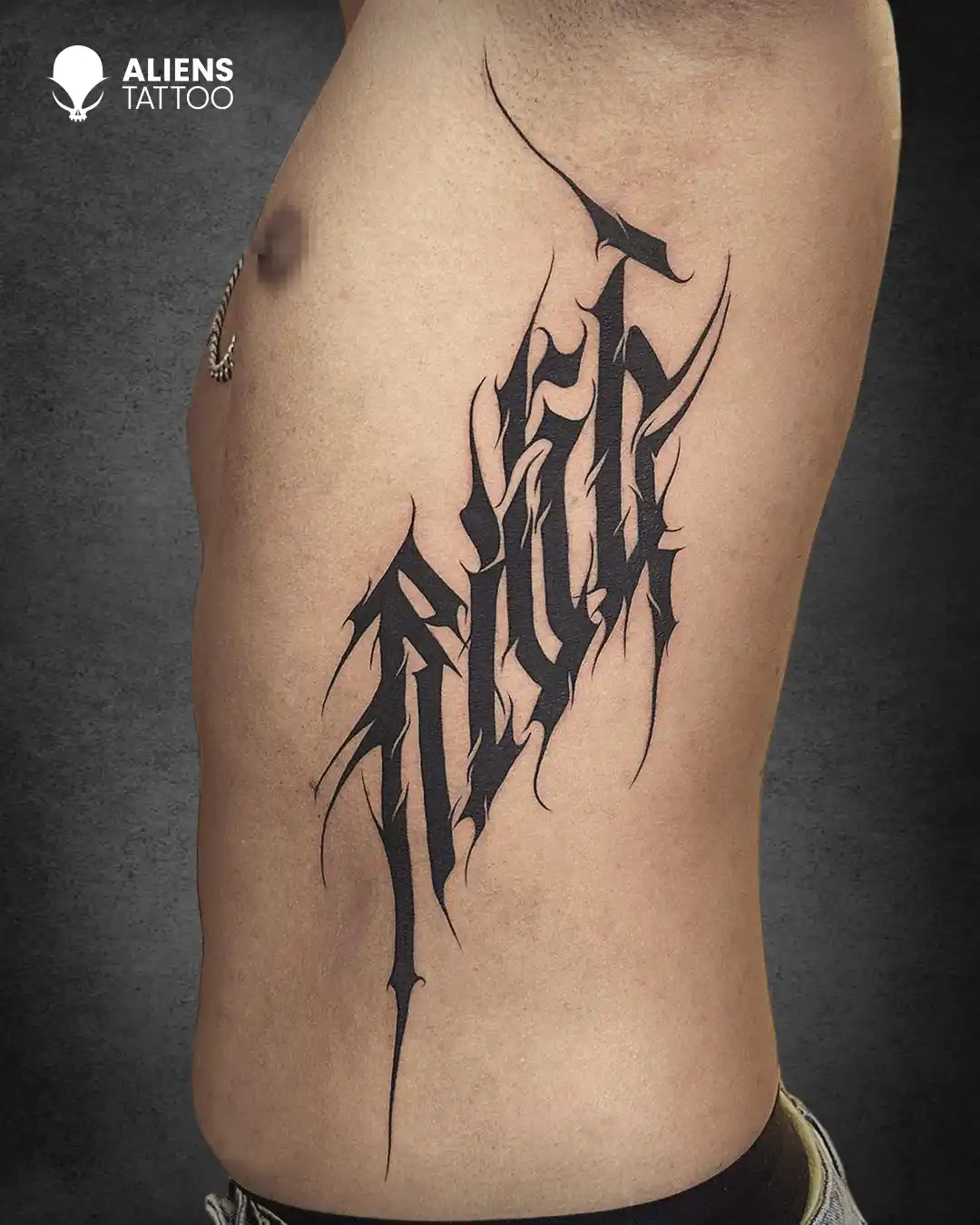 Calligraphy Script Tattoo
