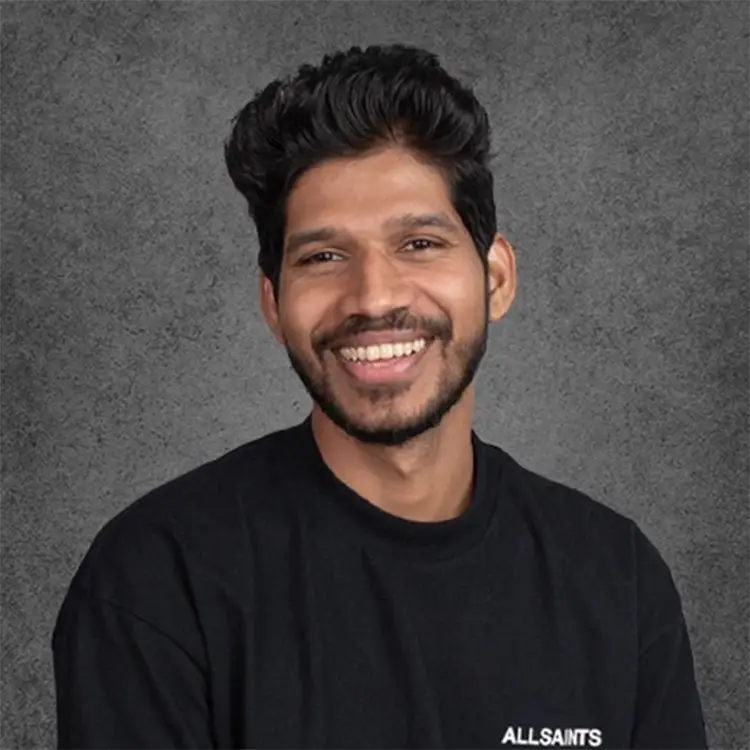 Allan Gois, a leading tattoo artist in Mumbai specializing in hyper-realism and portrait tattoos