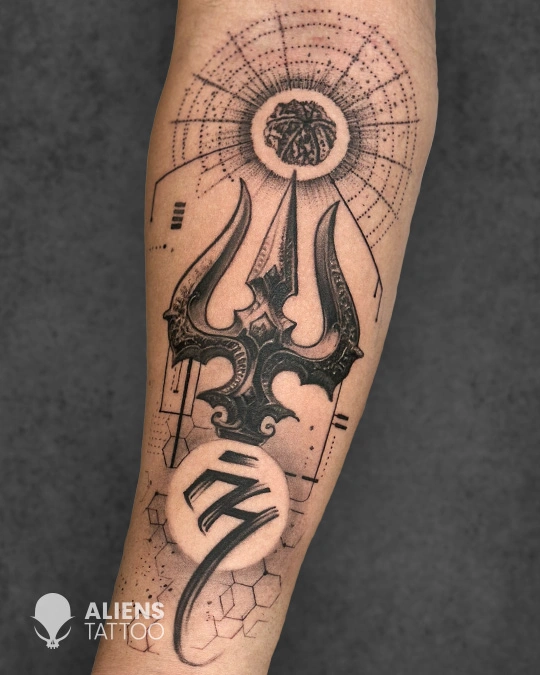 Geometric Trishul tattoo with fine line detailing done at the best tattoo studio in Hyderabad