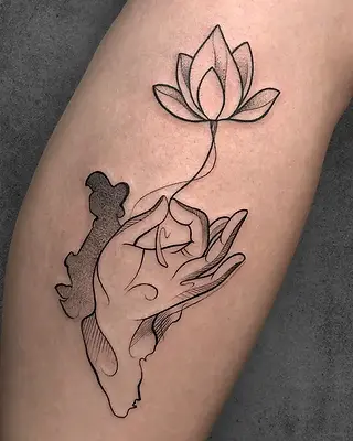 Minimalistic tattoo of a geometric flower with fine line art by Grishita Suthar at Aliens Tattoo in 