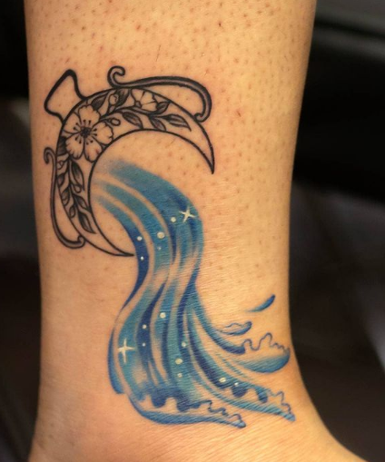 floral moon watercolor tattoo