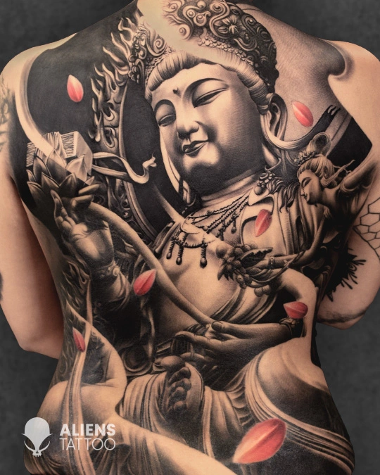 Large-scale abstract geometric full back tattoo with complex shading 3D depth