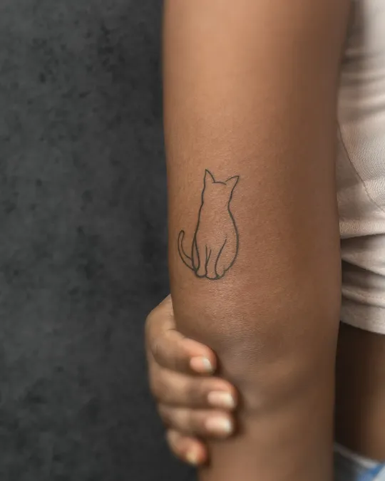 Minimal cat line art tattoo - Aliens Tattoo