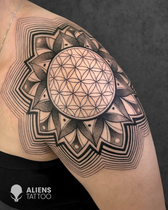 Mandala and sacred geometry shoulder tattoo at best tattoo studio in Delhi GK1