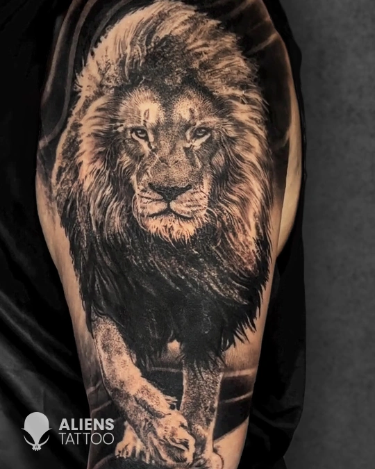 Realistic lion tattoo sleeve symbolizing strength done at best tattoo studio in Delhi GK1