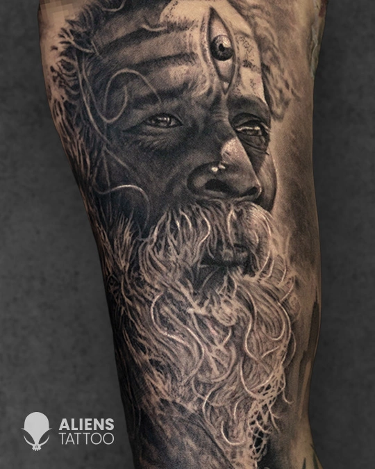 Hyper realistic sage portrait tattoo with long beard and third eye in black and grey realism style