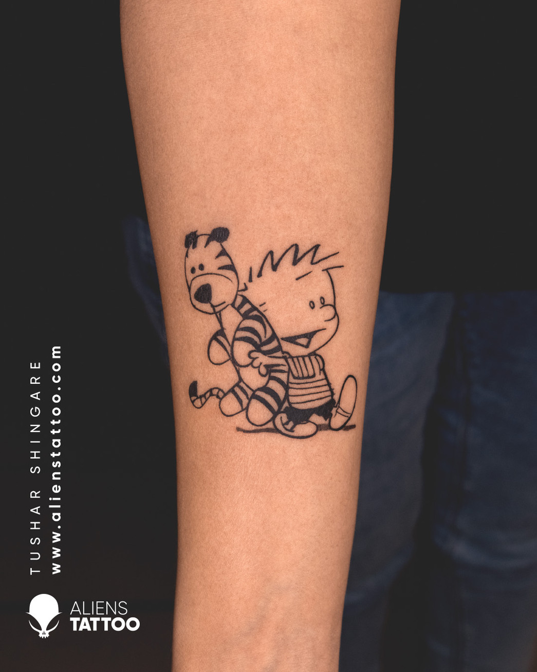 small cartoon tattoo